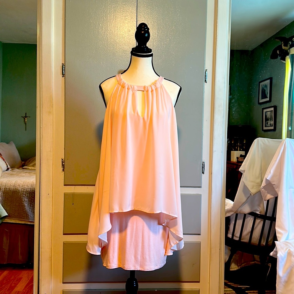 Sleeveless peach colored dress